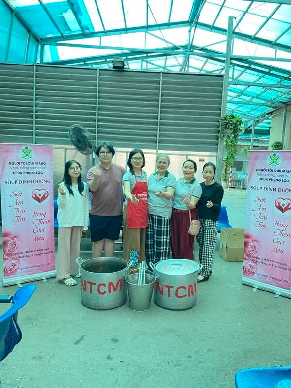 Volunteers participating in the soup and milk programme